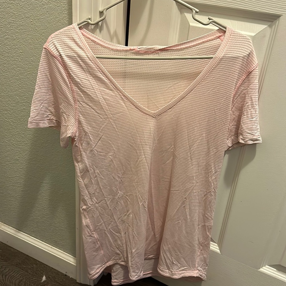 Baby Pink Lululemon T - Shirt PTP appx. 16” would fit medium.